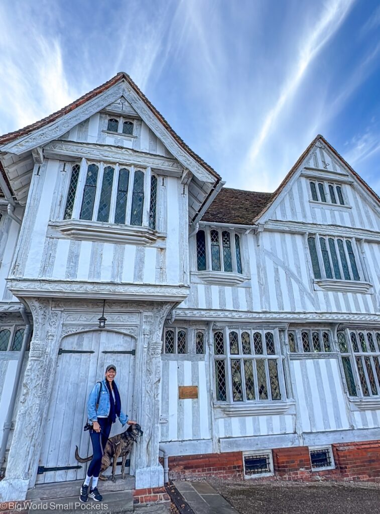 Suffolk, Lavenham, Dog and Me in Front of Tudor Guildhall Building