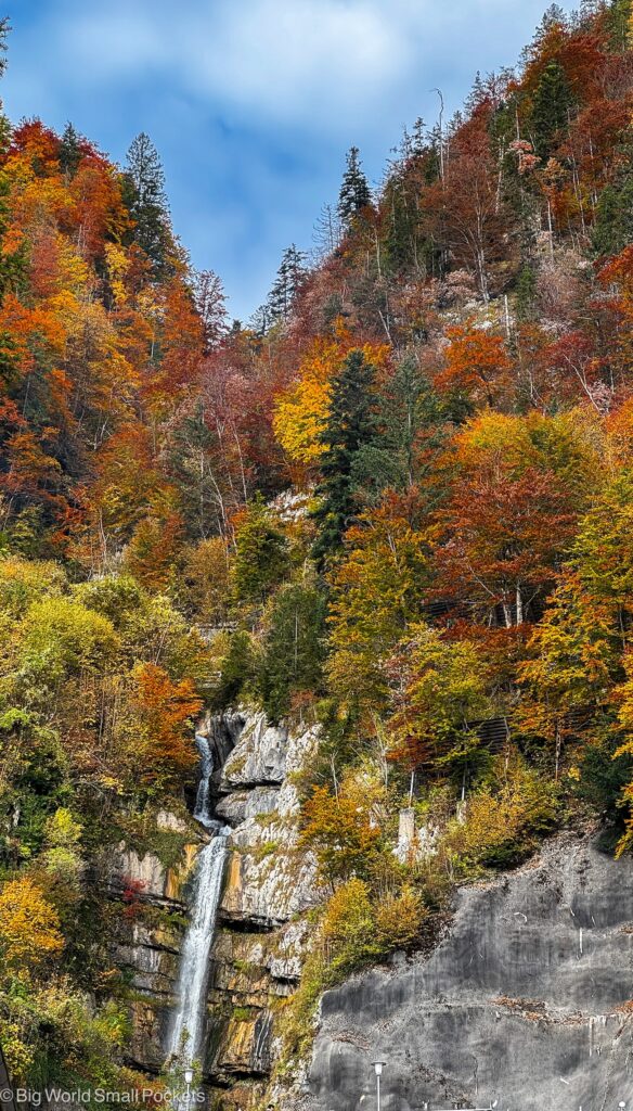 Austria, Hallstatt, Waterfall with Autumn Colours