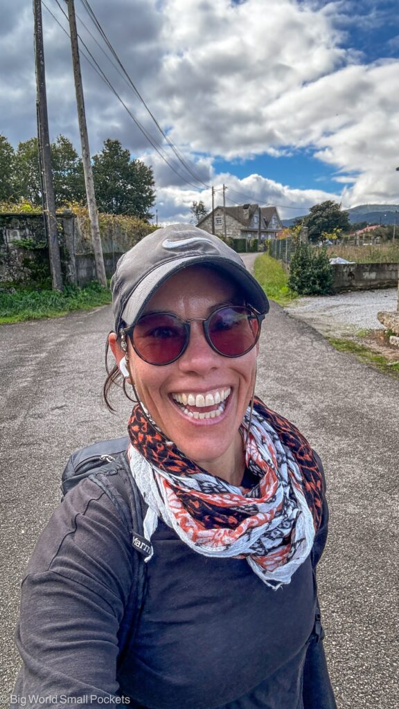 Camino de Santiago, Packing, Me Wearing Cap and Sweater