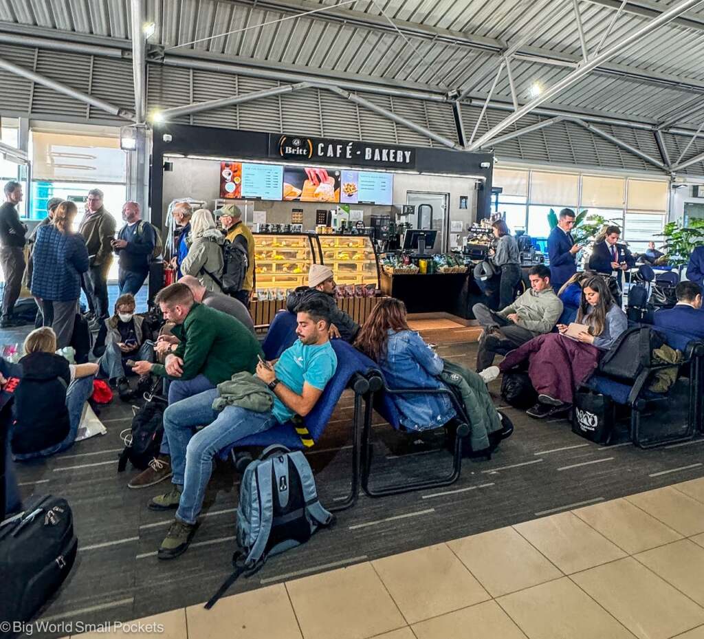 Airport, Seating Area, Disgruntled Crowds