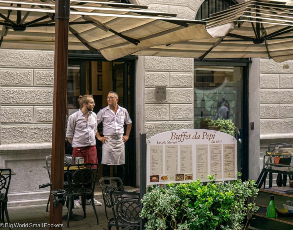 Italy, Trieste, Waiters Outside Restaurant