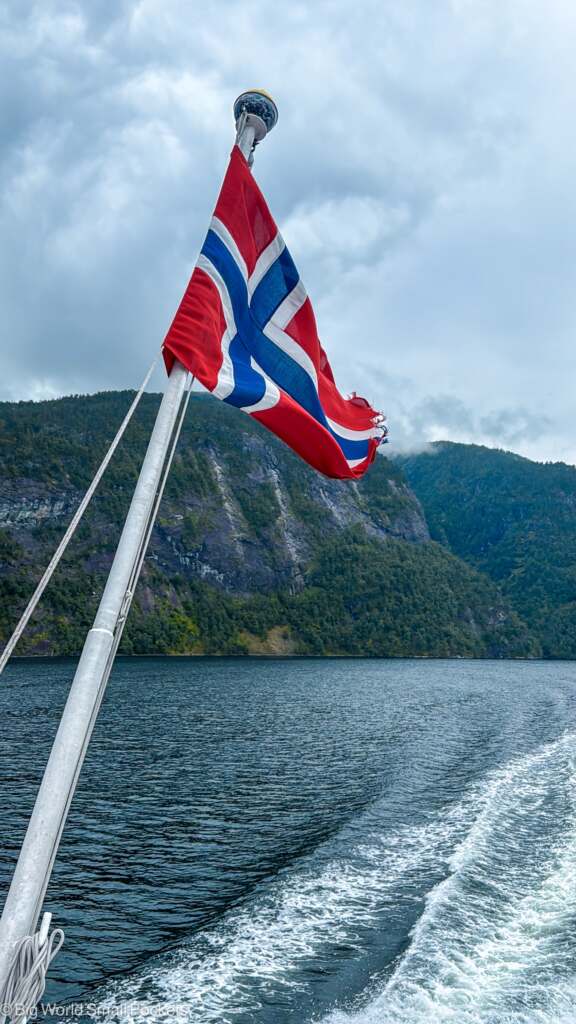 Norway, Bergen, Fjord Boat with Flag