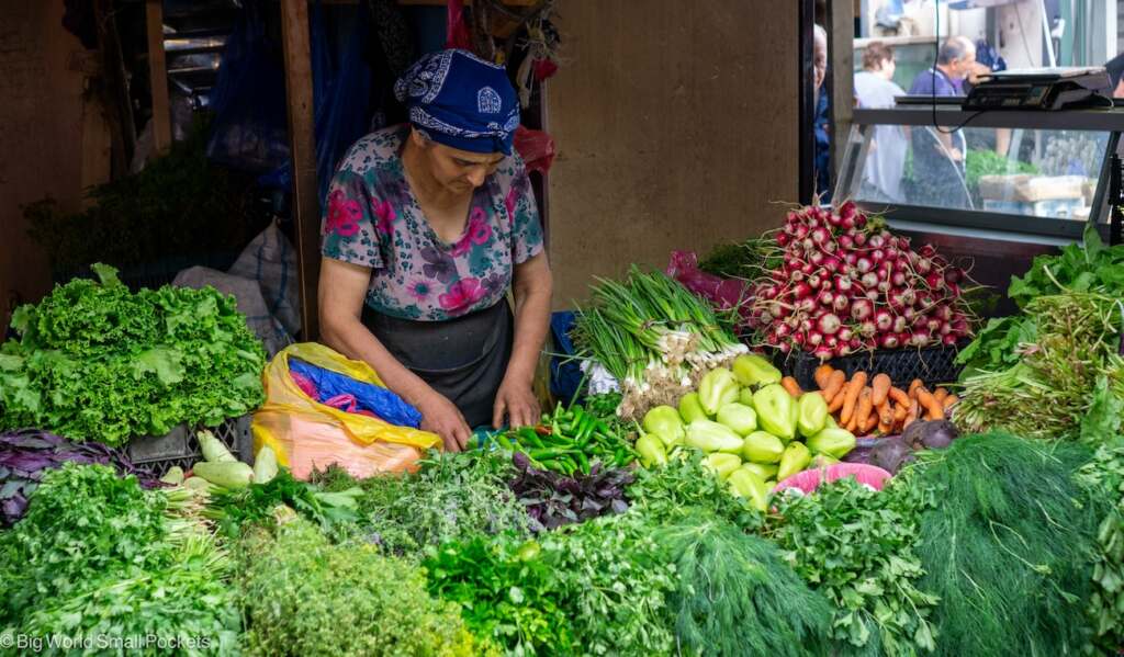 Georgia, Tbilisi, Woman at Market Stall